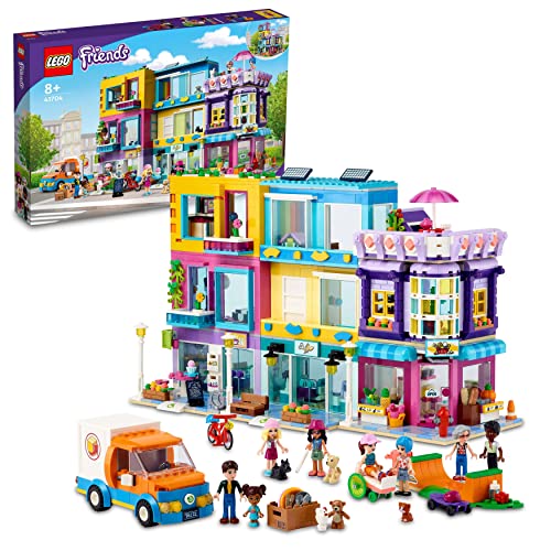 LEGO 41704 Friends Wohnblock in Heartlake City mit Friseursalon und Café, Puppenhaus mit 7 Mini-Puppen, Modellhaus-Bausatz mit Wohngebäuden, Kinderspielzeug