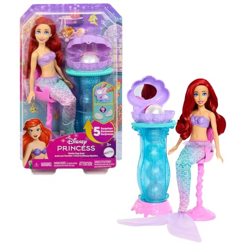 Mattel Disney-Princess-Spielzeuge, Schminkmuschel Meerjungfrau-Arielle-Modepuppe mit abnehmbarer Schwanzflosse, Schminktisch mit 5 wiederholbaren Pop-up-Überraschungen und 5 Accessoires, JBF86