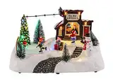 LED Weihnachts Szene Eisbahn mit fahrenden Figuren - 26x18x14 cm - Winter Dorf Tisch Deko beleuchtet