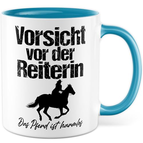 Reiterin Tasse mit Spruch - Geschenk Vorsicht vor der Reiterin Das Pferd ist harmlos - Kaffeetasse aus Keramik 330ml - Pferdemädchen Reiterin Pferd Stall Dressur Springreiten Reitclub Kaffee-Becher